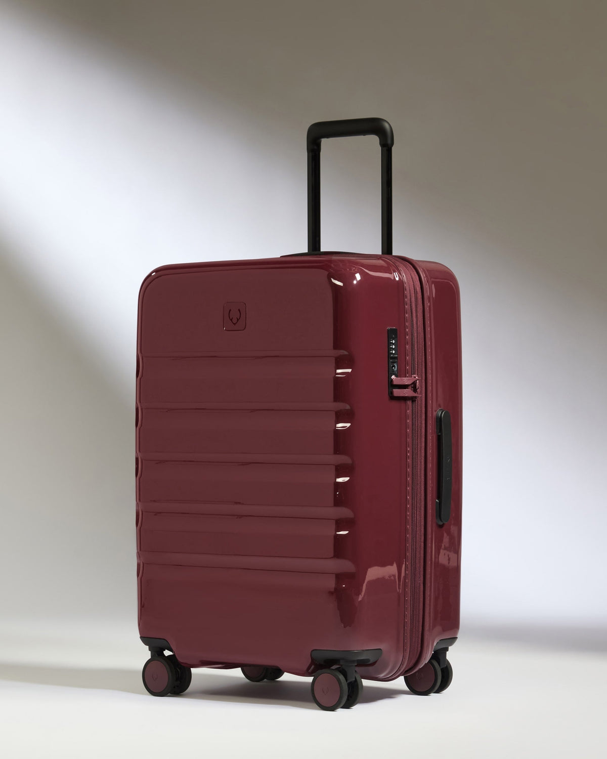 Medium Suitcase in Cedar Red Gloss - Icon Stripe
