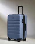 Medium Suitcase in Ocean Blue - Icon Stripe