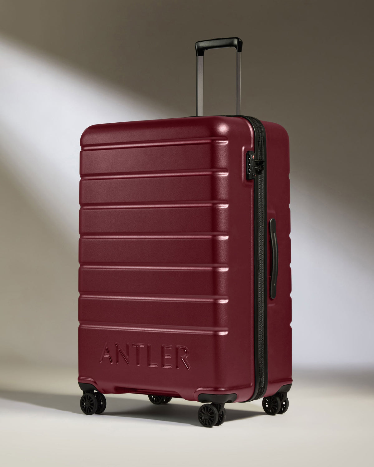 Large Luggage in Rich Red - Logo