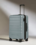 Medium Suitcase in Cool Grey - Logo
