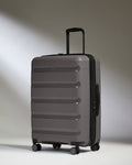 Medium Suitcase in Gloss Gull Grey - Logo Stripe