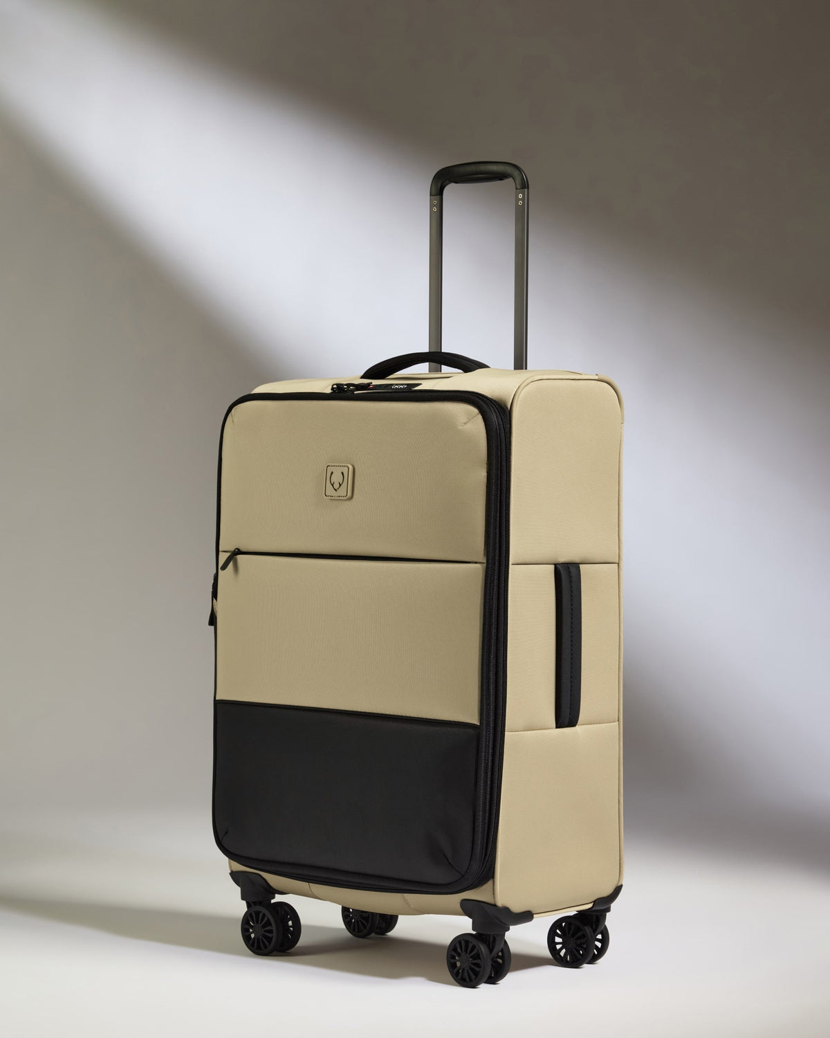 Lightest Medium Suitcase in Sand - Soft Stripe 2.0
