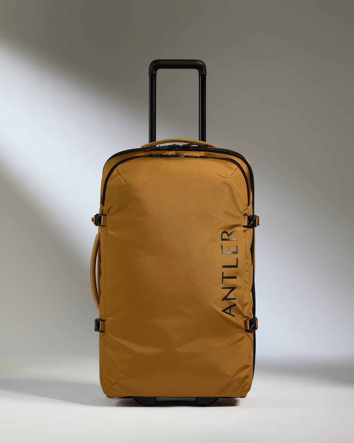 Discovery Wheeled Duffel in Mustard Yellow