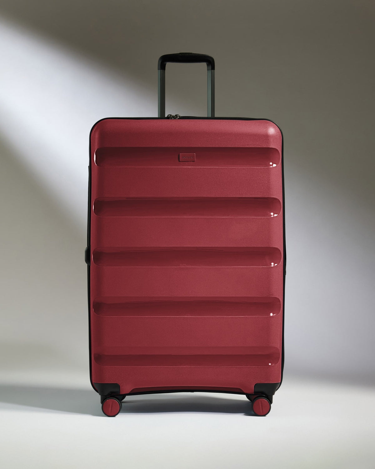 Large Suitcase in Soft Red - Logo Stripe