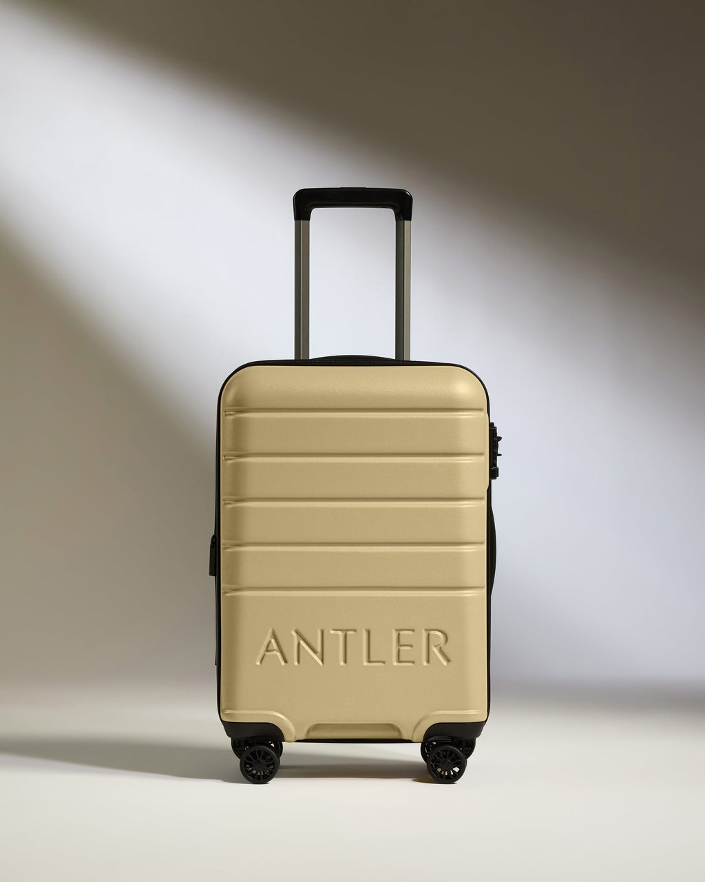 Expandable Suitcase Set in Dark Sand - Logo