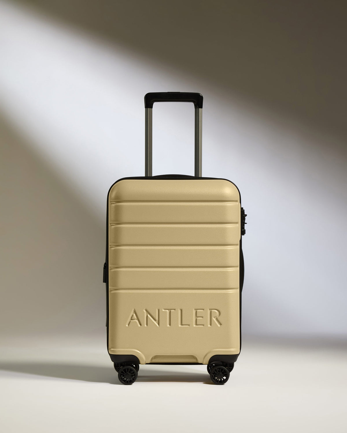 Expandable Suitcase Set in Dark Sand - Logo
