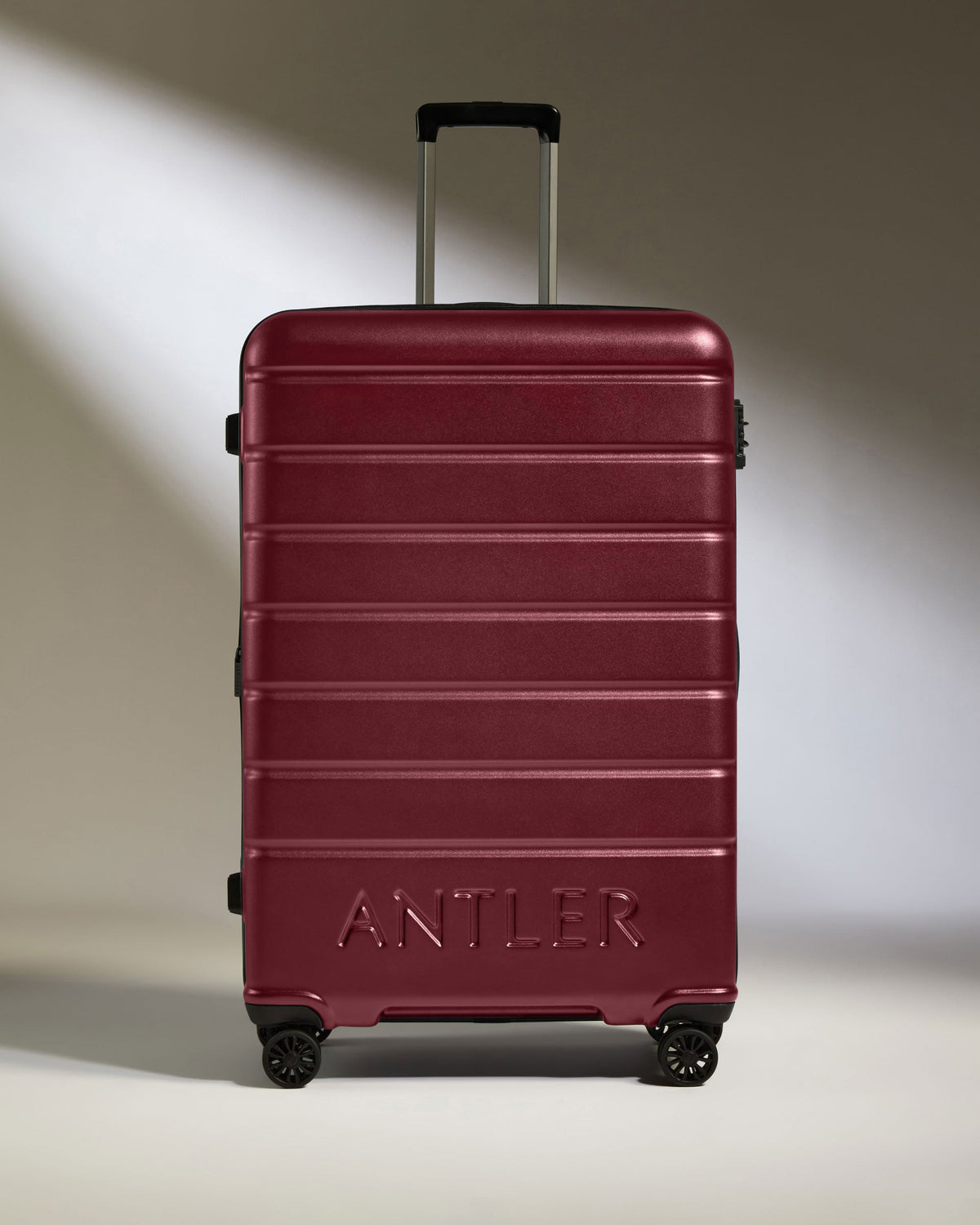 Large Luggage in Rich Red - Logo