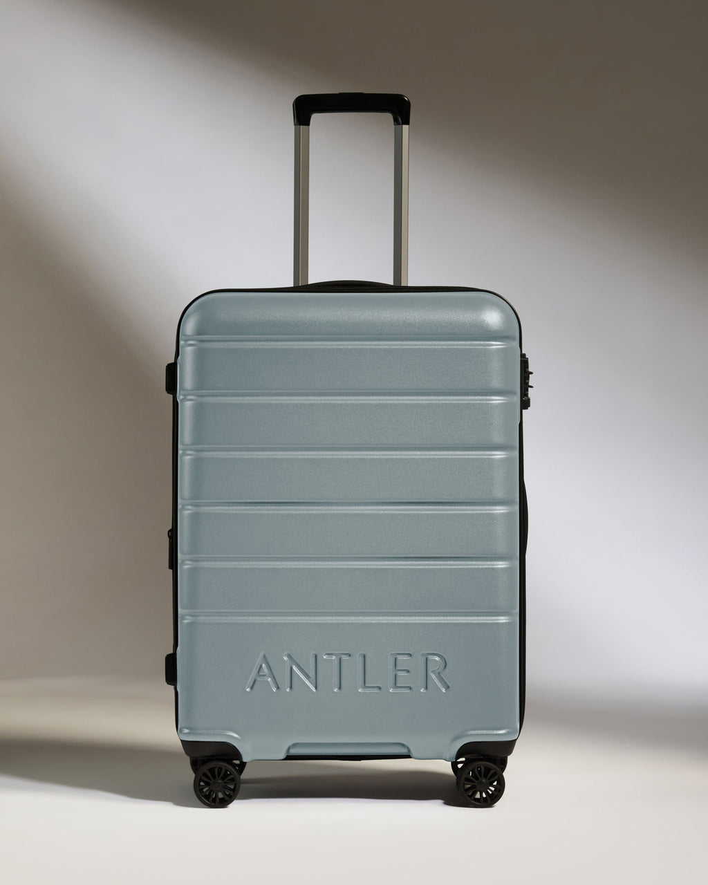 Medium Suitcase in Cool Grey - Logo