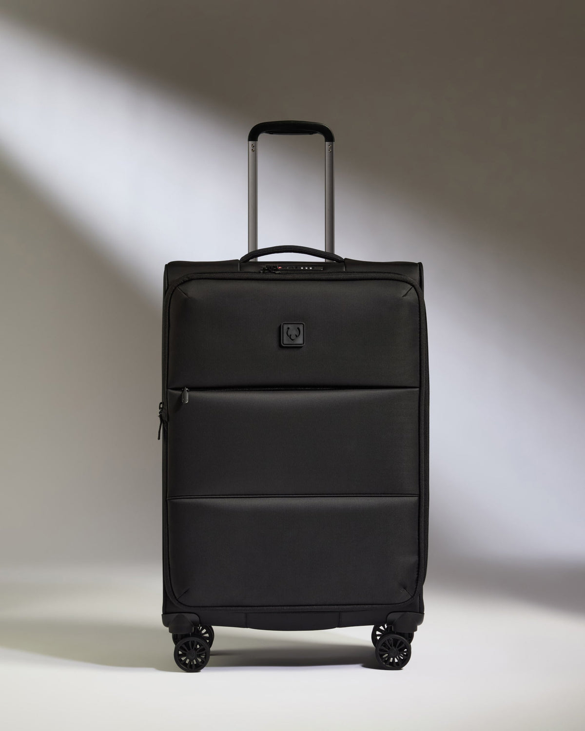 Lightest Medium Suitcase in Black - Soft Stripe 2.0