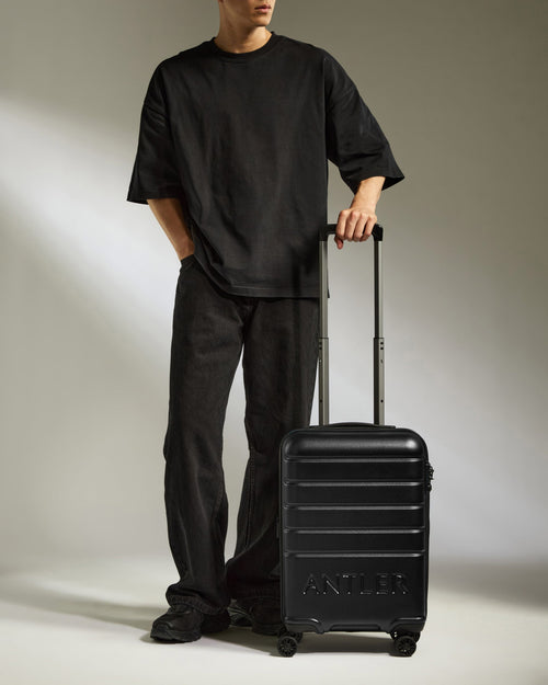 Cabin Suitcase in Black - Logo