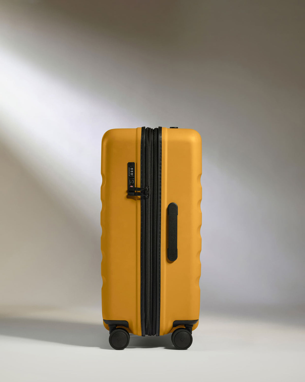 Medium Suitcase in Mustard Yellow - Icon Stripe