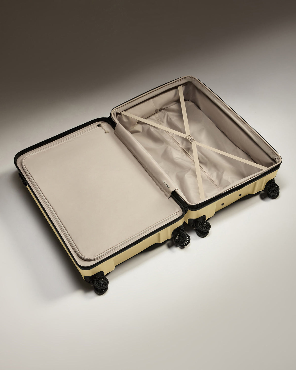 Expandable Suitcase Set in Dark Sand - Logo