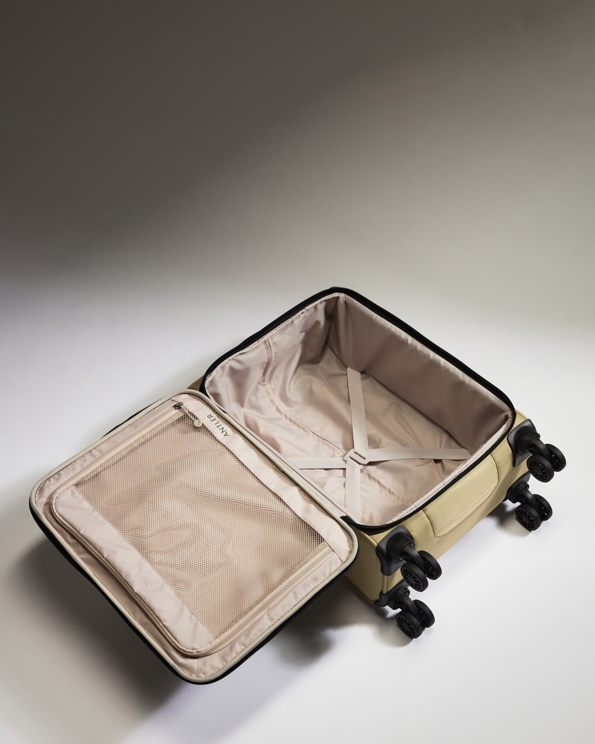 Lightest Cabin Suitcase in Sand - Soft Stripe 2.0