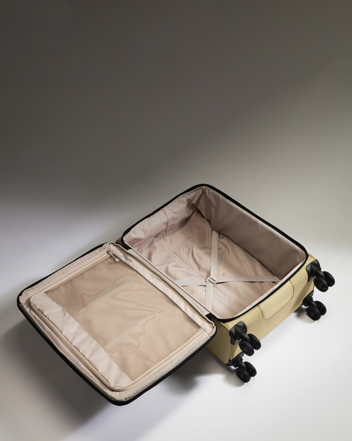 Lightest Medium Suitcase in Sand - Soft Stripe 2.0