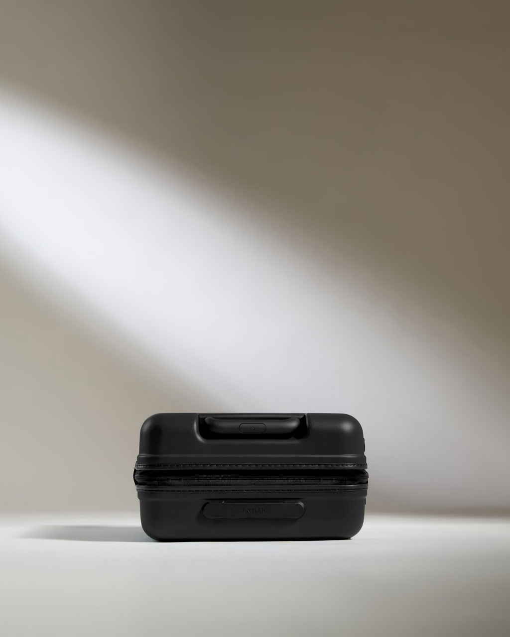 Cabin Suitcase in Black - Icon Stripe