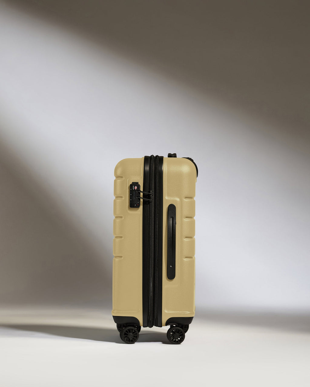 Expandable Cabin Suitcase in Dark Sand - Logo