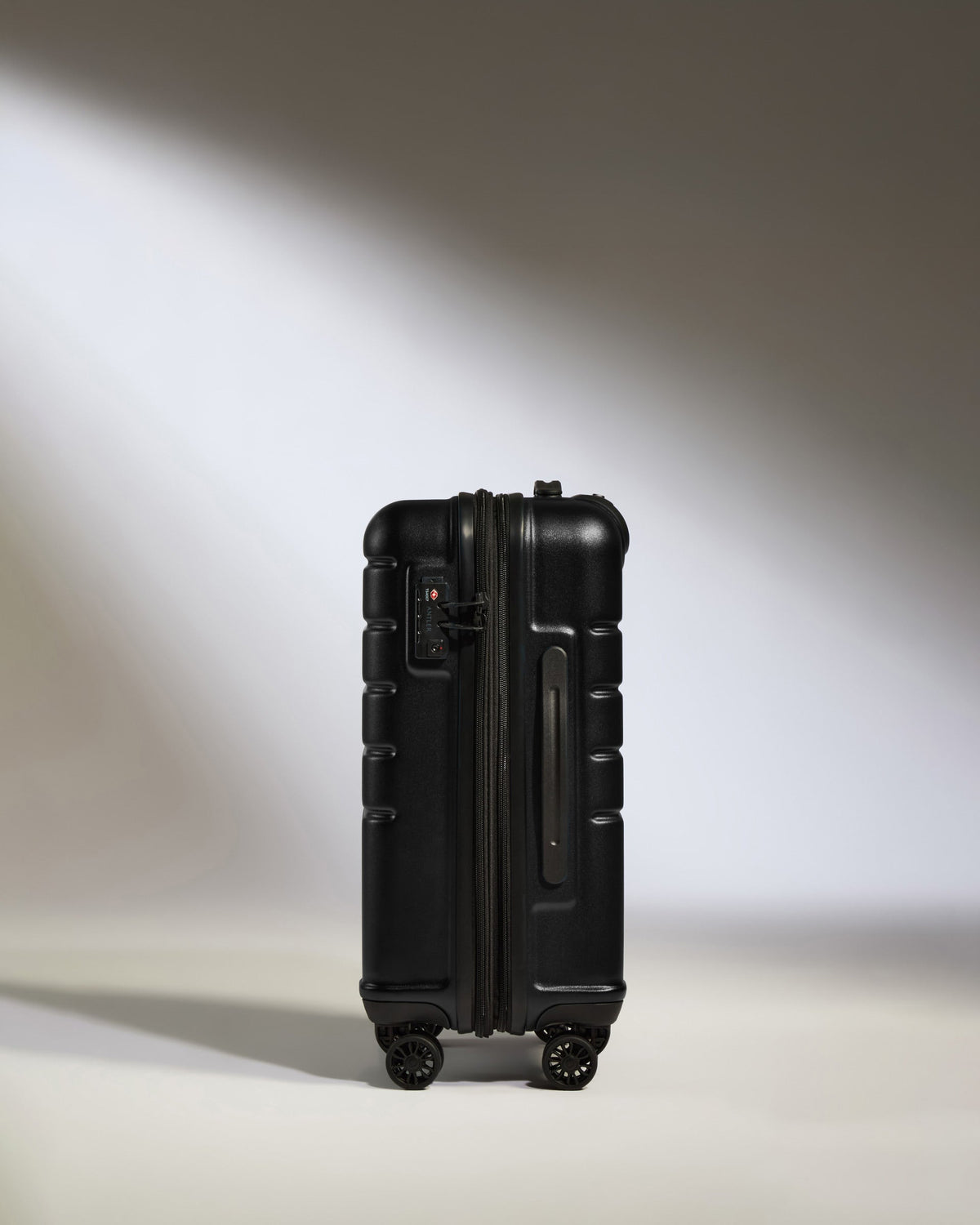 Cabin Suitcase in Black - Logo