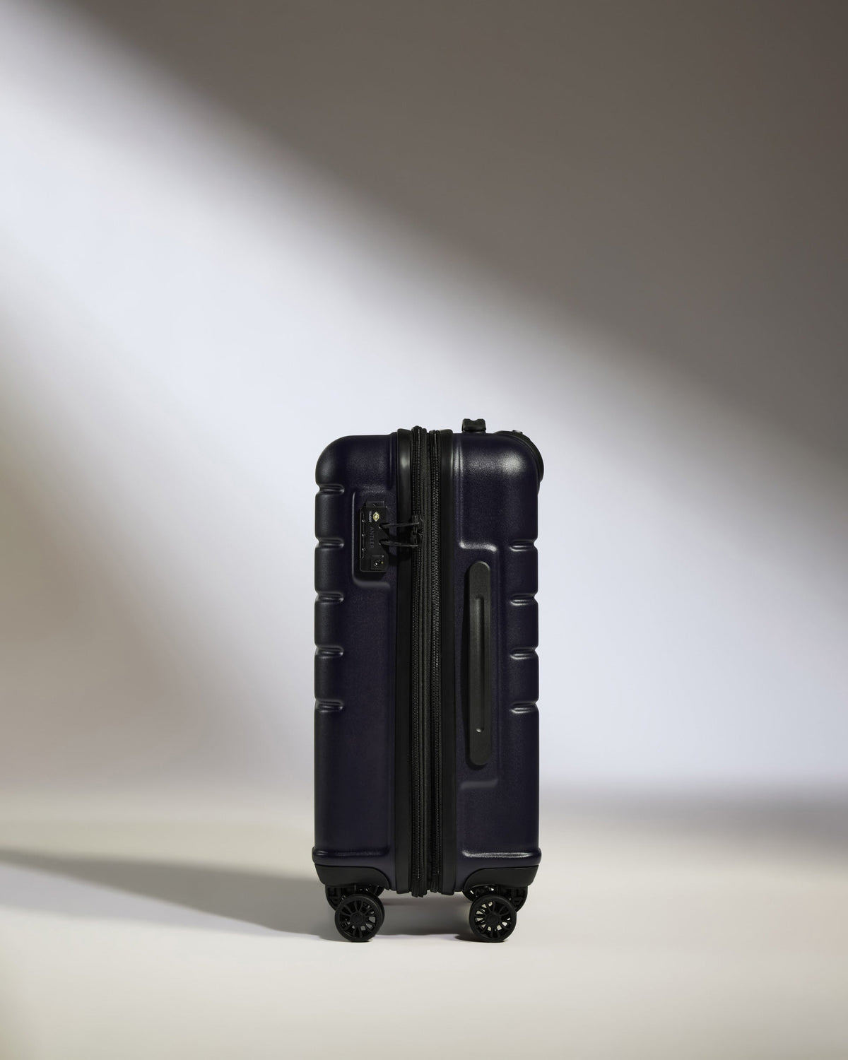 Cabin Suitcase in Dark Purple - Logo