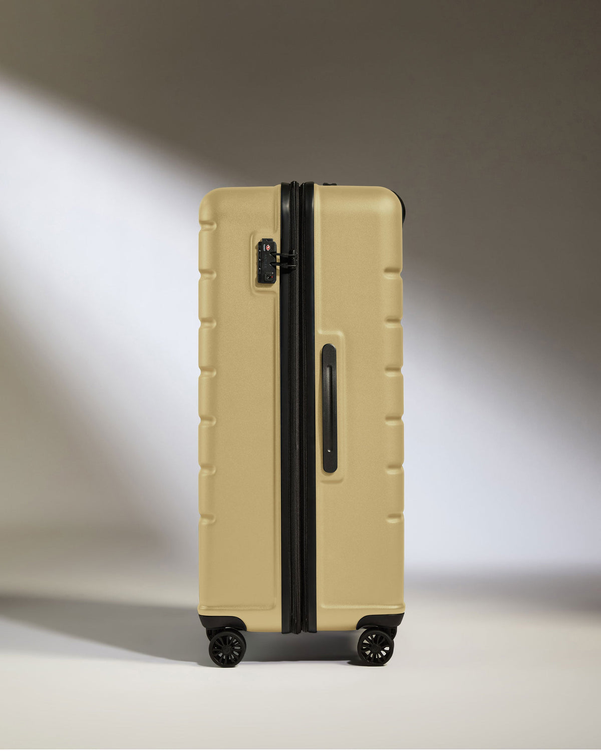 Suitcase Set in Dark Sand - Logo