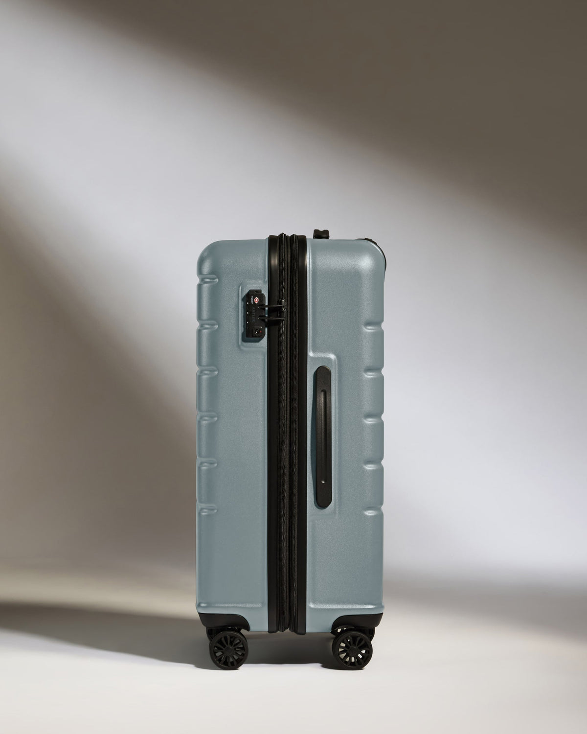 Medium Suitcase in Cool Grey - Logo