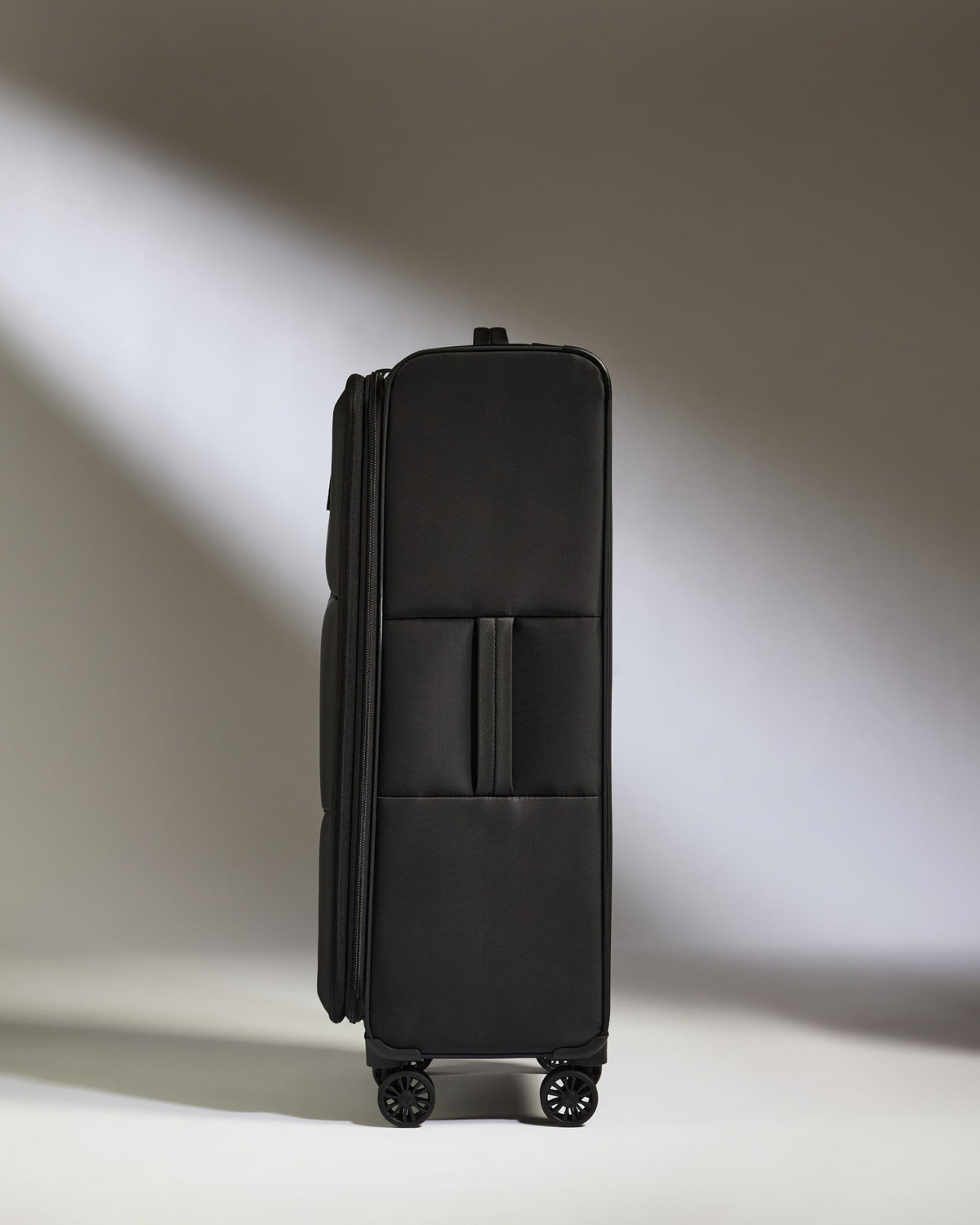 Lightest Large Suitcase in Black - Soft Stripe 2.0
