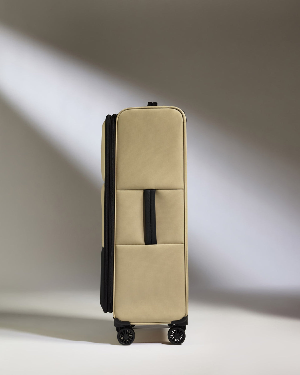 Lightest Large Suitcase in Sand - Soft Stripe 2.0