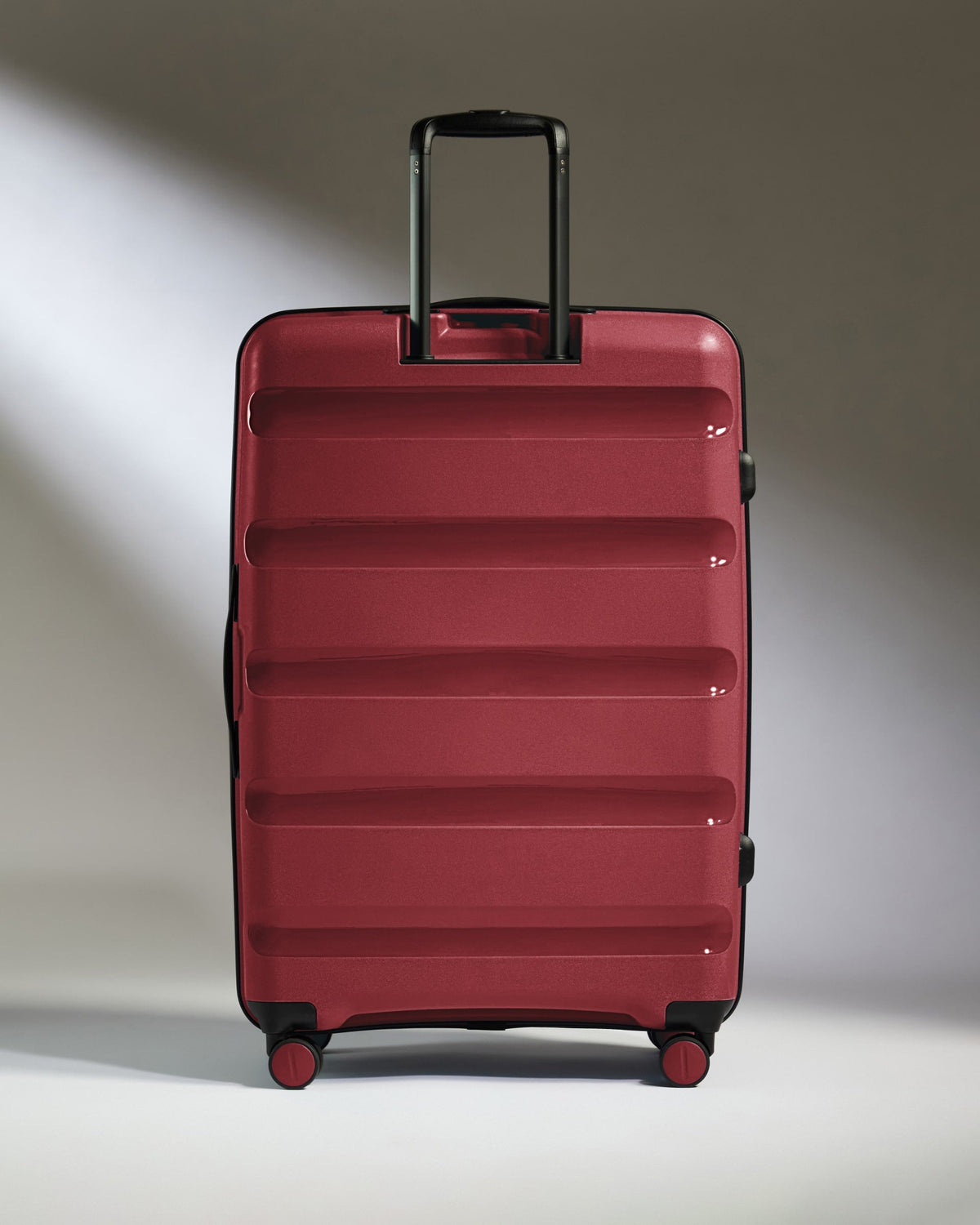 Large Suitcase in Soft Red - Logo Stripe