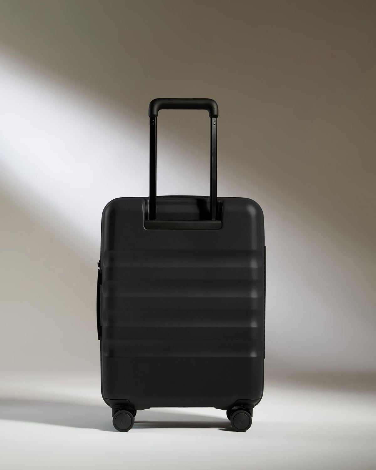 Cabin Suitcase in Black - Icon Stripe