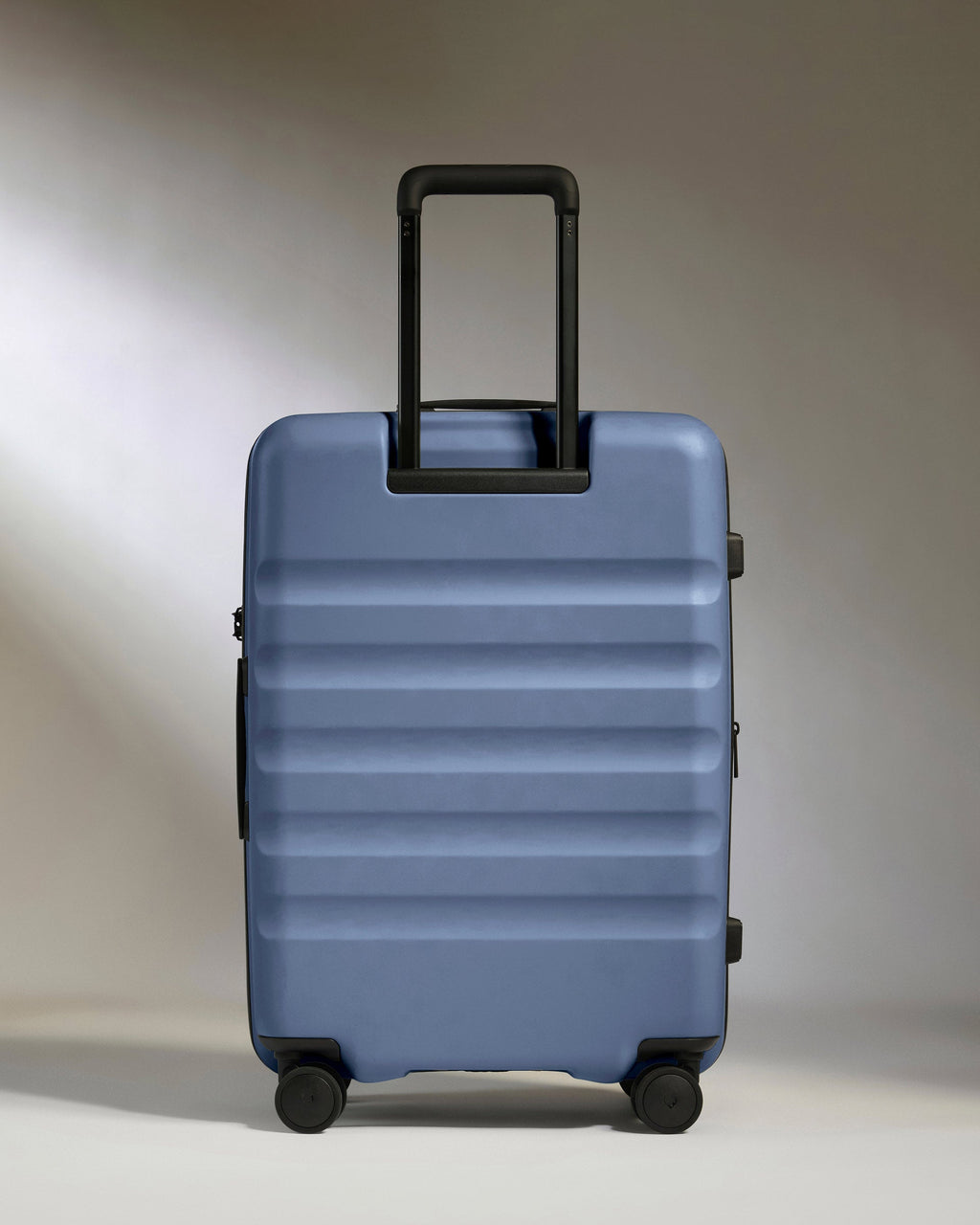 Medium Suitcase in Ocean Blue - Icon Stripe