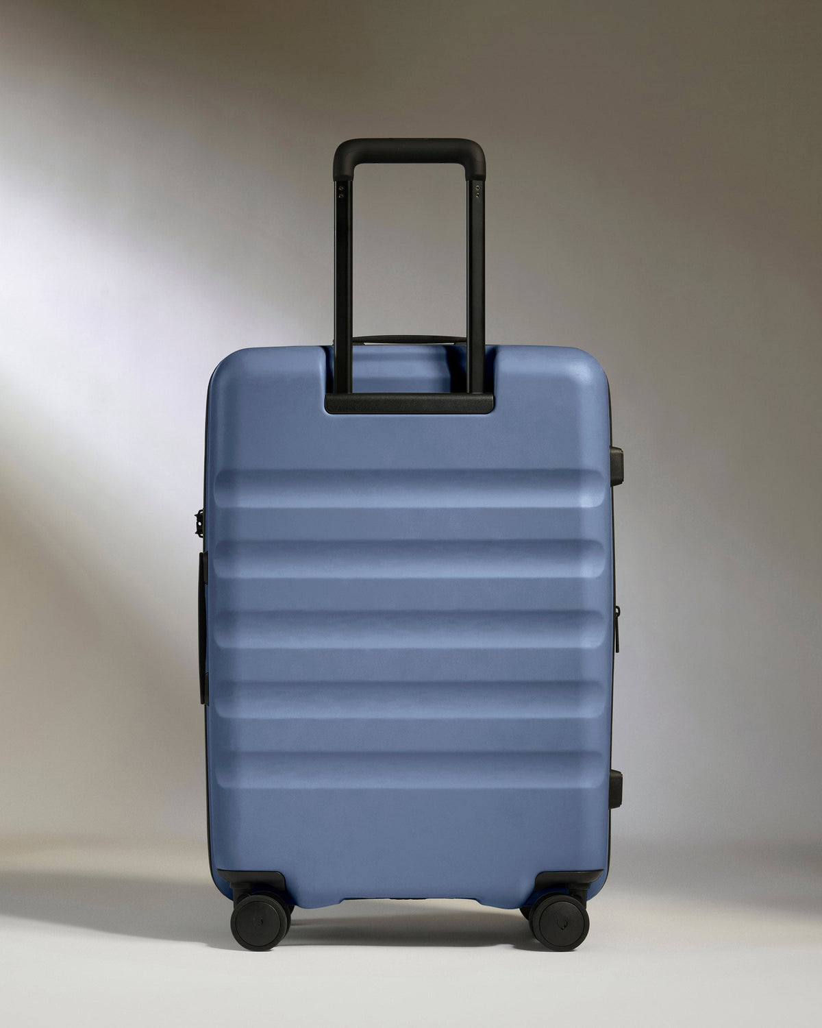 Medium Suitcase in Ocean Blue - Icon Stripe