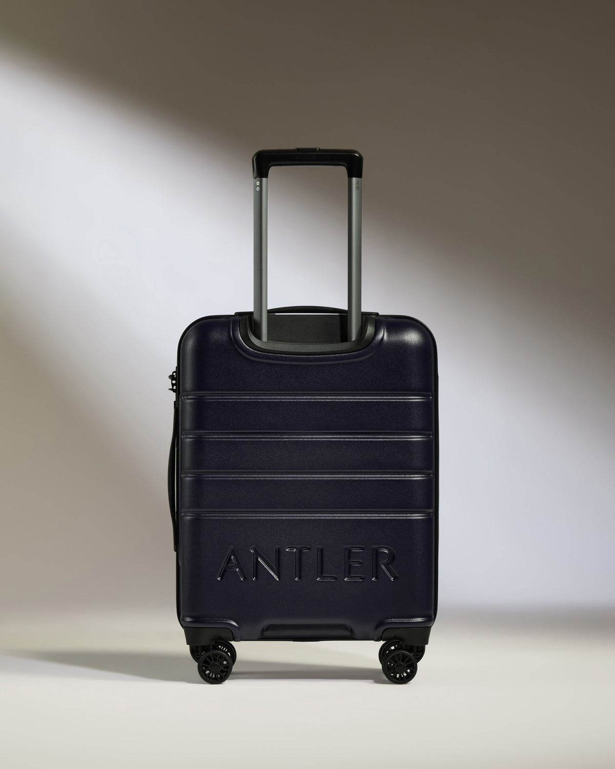 Cabin Suitcase in Dark Purple - Logo