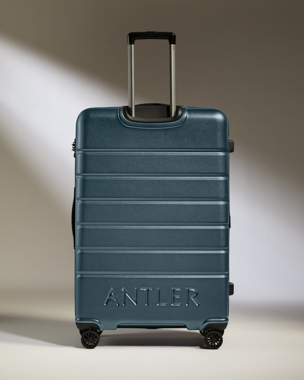 Large Suitcase in Blue Grey - Logo