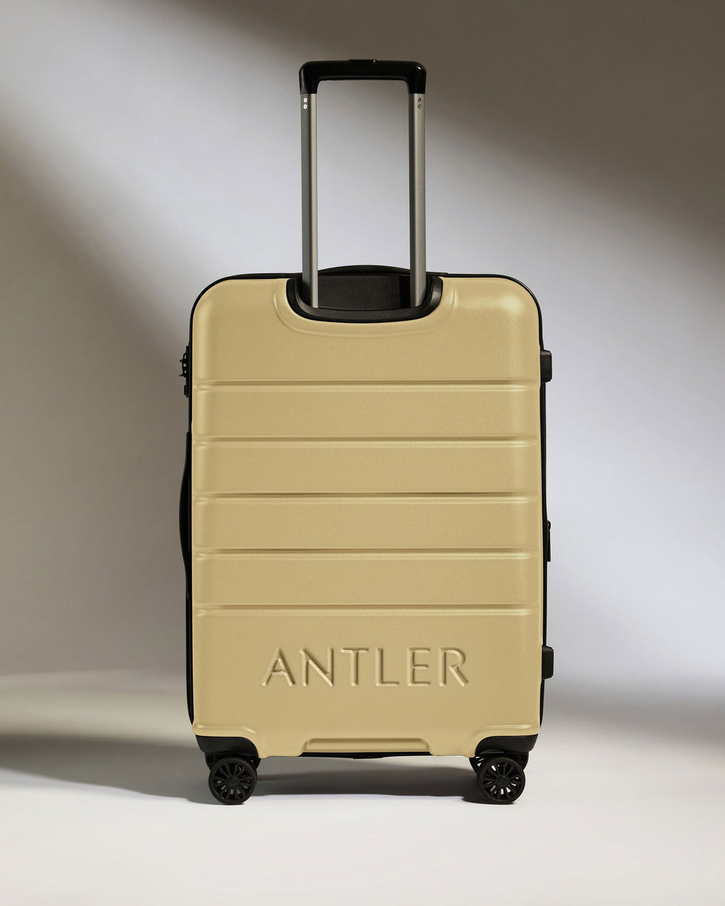Expandable Suitcase Set in Dark Sand - Logo