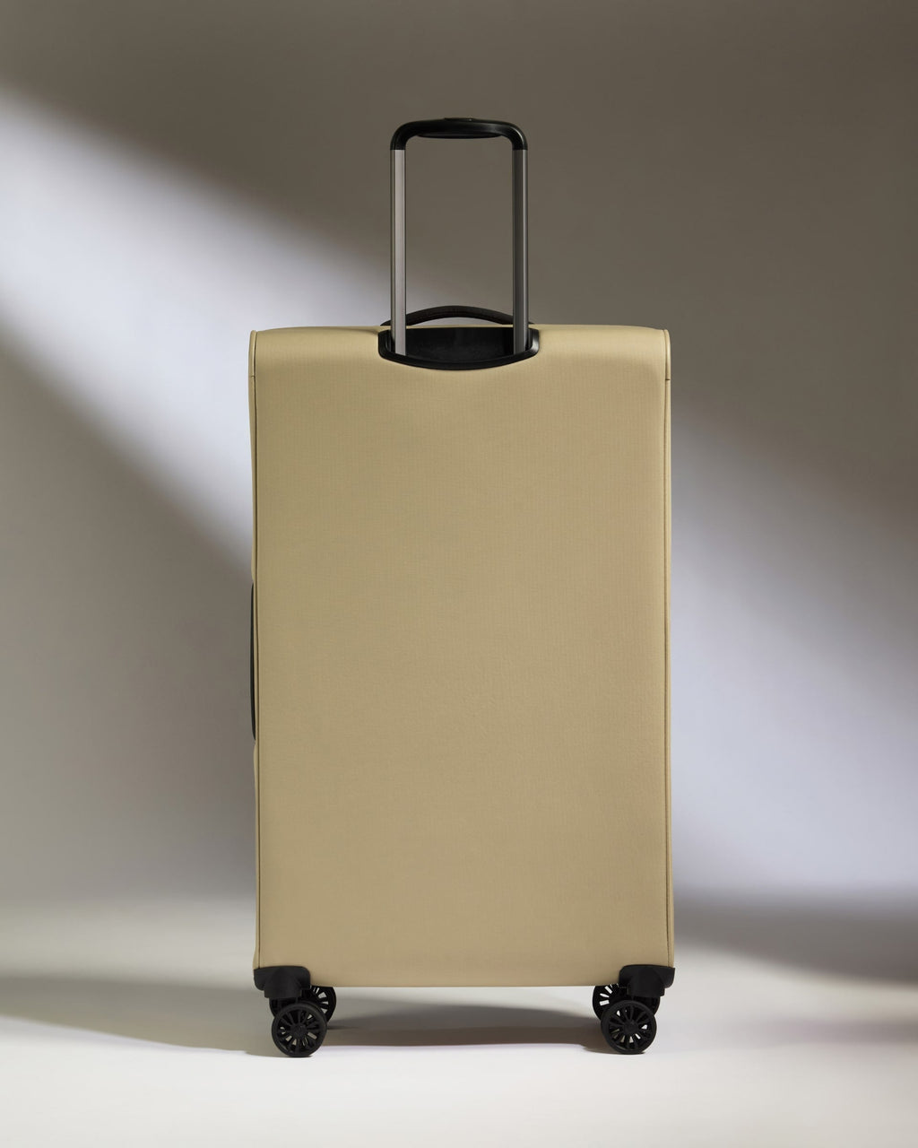 Lightest Large Suitcase in Sand - Soft Stripe 2.0
