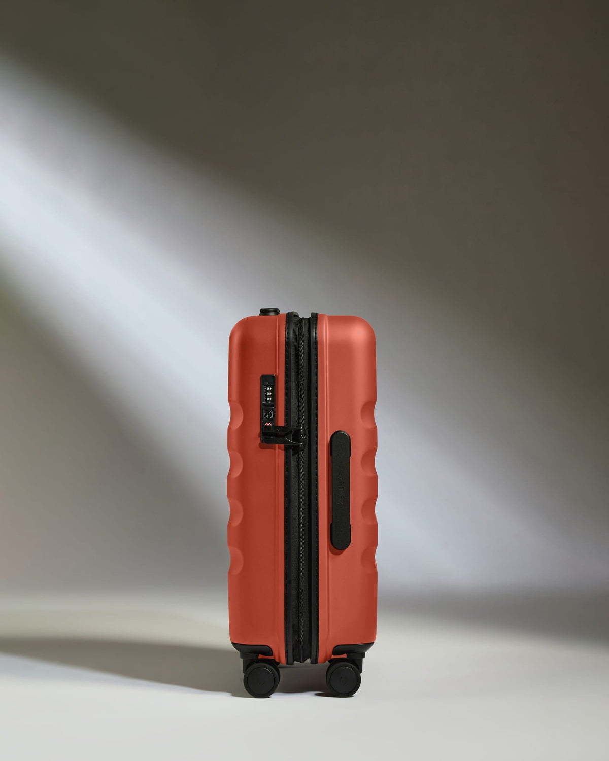 Cabin Suitcase in Buckthorn Red - Icon Stripe