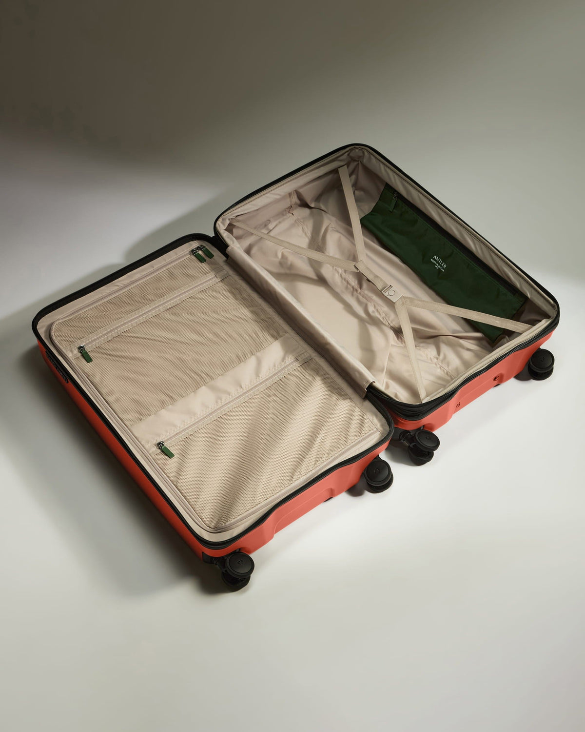 Large Suitcase in Buckthorn Red - Icon Stripe