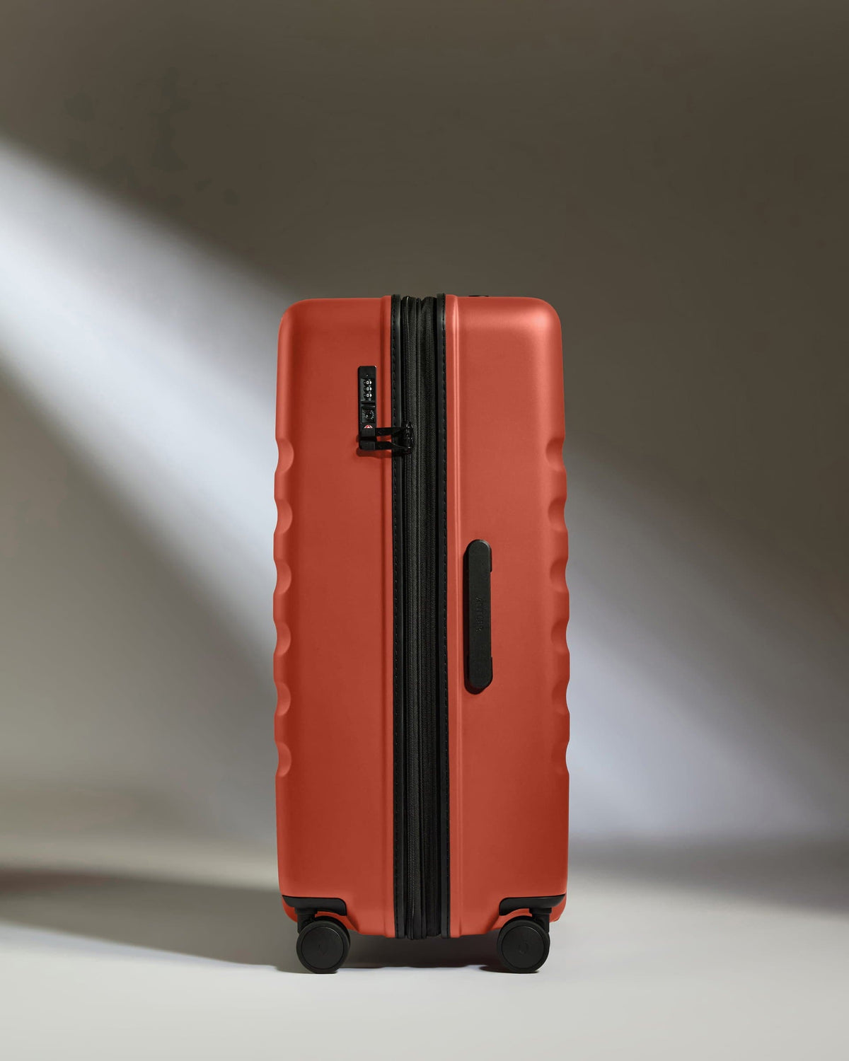 Large Suitcase in Buckthorn Red - Icon Stripe