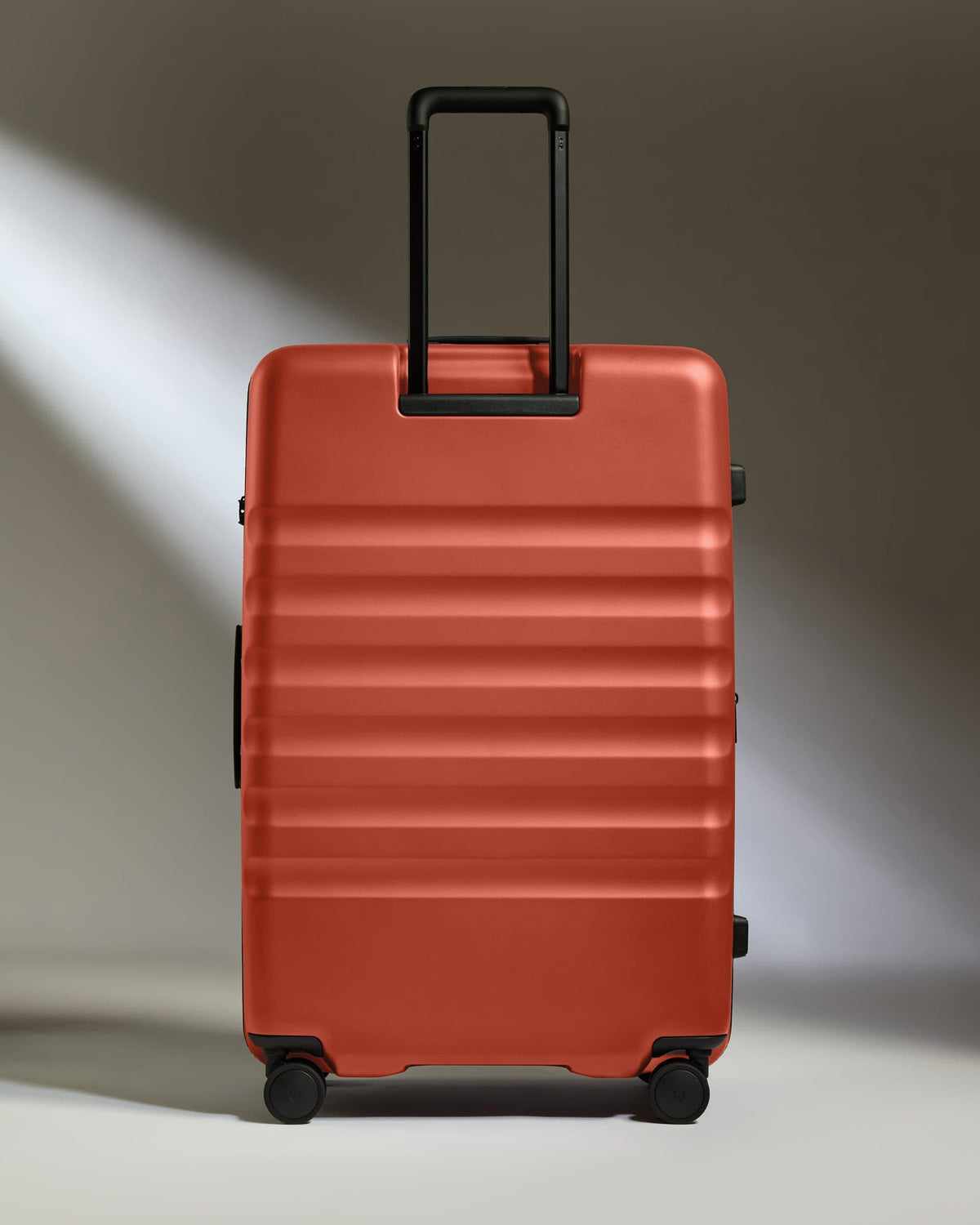 Large Suitcase in Buckthorn Red - Icon Stripe