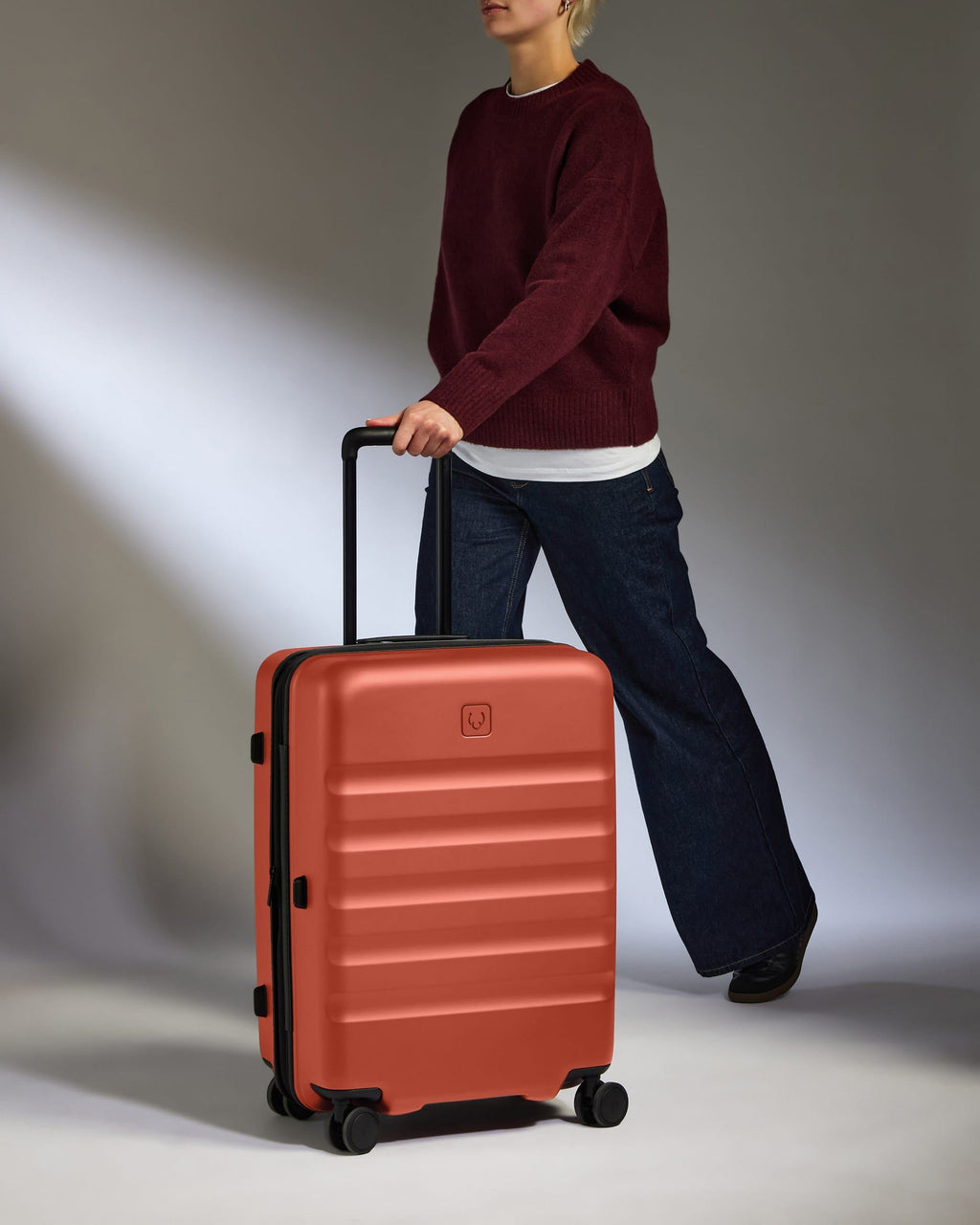 Medium Suitcase in Buckthorn Red - Icon Stripe