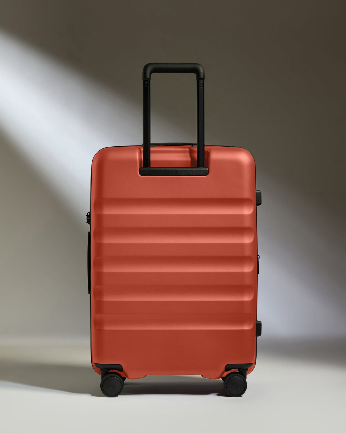 Medium Suitcase in Buckthorn Red - Icon Stripe